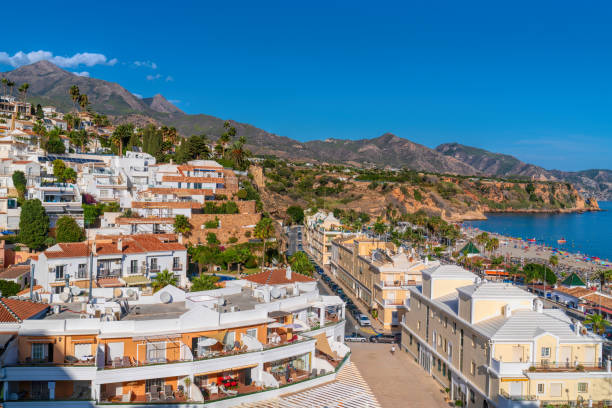 Burriana town and beach Nerja Costa del Sol Andalusia Spain and blue sky